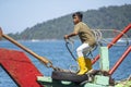 Portrait of a Malaysian male worker on the fishing boat in Kota Kinabalu, Sabah, Malaysia Royalty Free Stock Photo