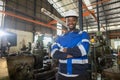 Portrait male african american worker happy smiling wear hardhat standing at factory industrial. Engineering worker man work Royalty Free Stock Photo