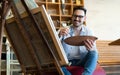 Portrait Of Male Artist Working On Painting In Studio Royalty Free Stock Photo