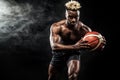 Portrait of afro-american sportsman, basketball player with a ball over black background. Fit young man in sportswear Royalty Free Stock Photo