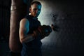 Portrait of male boxer with drops of perspiration on his face