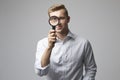 Portrait Of Male Criminologist With Magnifying Glass