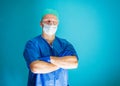 Portrait of male doctor with medical glasses and face mask