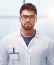 portrait of a male doctor standing in the lobby and looking ahead Royalty Free Stock Photo