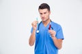 Portrait of a male doctor with test tube