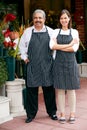 Portrait Of Male And Female Florist Outside Shop Royalty Free Stock Photo