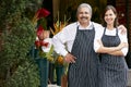 Portrait Of Male And Female Florist Outside Shop Royalty Free Stock Photo