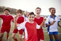 Portrait Of Male And Female High School Soccer Teams Celebrating Royalty Free Stock Photo