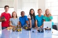 Portrait Of Male And Female Students Building Robot Vehicle In After School Computer Coding Class Royalty Free Stock Photo