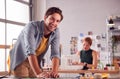 Portrait Of Male And Female Students Or Business Owners Working In Fashion Studio Together Royalty Free Stock Photo