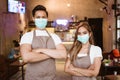 Waitress wearing a face mask at the coffee shop