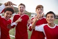 Portrait Of Male High School Soccer Team Celebrating Royalty Free Stock Photo