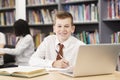 Portrait Of Male High School Student Wearing Uniform Working At Royalty Free Stock Photo