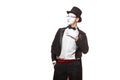 Portrait of a male mime artist performing, isolated on white background. Symbol of contempt, censure, disapproval