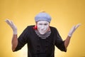 Portrait of male mime isolated on yellow Royalty Free Stock Photo