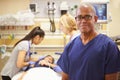 Portrait Of Male Nurse Working In Emergency Room