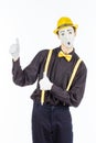 Portrait of a male, pantomime actor looking at camera and showing thumb up. Royalty Free Stock Photo