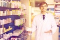 Portrait of male pharmacists working in modern farmacy Royalty Free Stock Photo