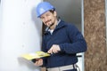 portrait male plasterer on site