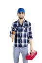 Male plumber carrying tool box on studio Royalty Free Stock Photo