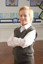 Portrait Of Male Primary School Pupil Standing In Royalty Free Stock Photo