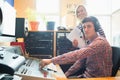 Portrait of male radio host using sound mixer Royalty Free Stock Photo