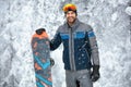 Portrait of male snowboarder on the mountain Royalty Free Stock Photo