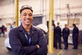 Portrait Of Male Student With Safety Glasses Studying For Auto Mechanic Apprenticeship At College Royalty Free Stock Photo