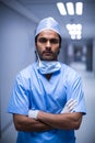 Portrait of male surgeon standing with arms crossed Royalty Free Stock Photo