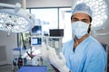Portrait of male surgeon standing in operation theater Royalty Free Stock Photo