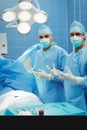 Portrait of male surgeons preparing for operation in operation room Royalty Free Stock Photo