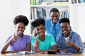 Portrait of male teacher with african american students Royalty Free Stock Photo