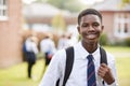 Portrait Of Male Teenage Student In Uniform Outside Buildings Royalty Free Stock Photo