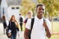 Portrait Of Male Teenage Student Walking Around College Campus Royalty Free Stock Photo