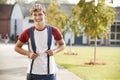 Portrait Of Male Teenage Student Walking Around College Campus Royalty Free Stock Photo