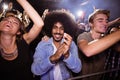 Portrait of man amidst crowd at nightclub Royalty Free Stock Photo