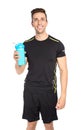 Portrait of man with bottle of protein shake