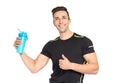 Portrait of man with bottle of protein shake