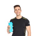 Portrait of man with bottle of protein shake