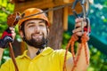 Young man enjoy active leisure in extreme rope park Royalty Free Stock Photo