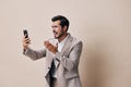 portrait man call handsome phone suit business happy smartphone hold smile Royalty Free Stock Photo