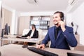 Portrait of man from customer support line in the office Royalty Free Stock Photo