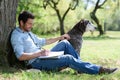 portrait man and dog outdoors Royalty Free Stock Photo