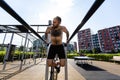 portrait of a man doing sports on the street with sports machine Royalty Free Stock Photo