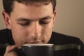 Portrait of man drinking hot beverage Royalty Free Stock Photo