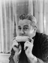 Portrait of a man eating a corn cob