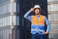 portrait man engineer standing working standing at rooftop building construction. Male technician worker working checking hvac of Royalty Free Stock Photo