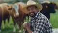 Portrait of man, farmer or cows on farm agriculture for livestock, sustainability or business in countryside. Smile Royalty Free Stock Photo