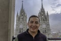 portrait of a man in front of the basilica of the national vote quito ecuador