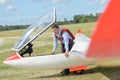 Portrait man getting into glider Royalty Free Stock Photo